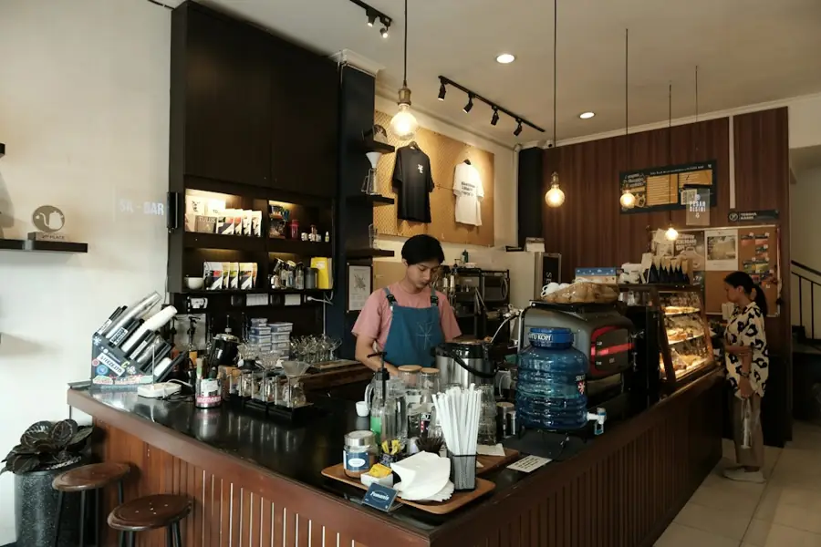 A barista preparing drinks at a coffee bar